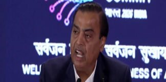 Mukesh Ambani speaking at AI Impact Summit about India’s AI investment strategy