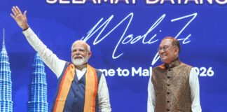 Prime Minister Narendra Modi receives a guard of honor in Putrajaya during his Malaysia visit