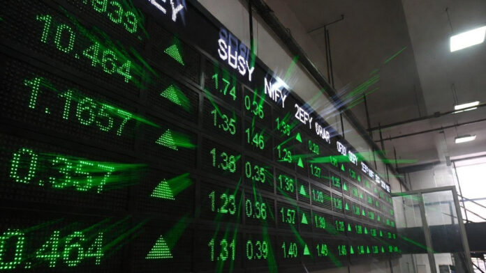 sensex-nifty-closing-bell-m Digital display board showing Sensex and Nifty gains inside Bombay Stock Exchange
