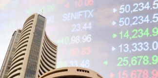 Bombay Stock Exchange building in Mumbai with Sensex and Nifty trading data displayed