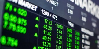 Indian stock market screen showing Sensex and Nifty rising in green