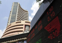 Indian Stock Market Opens Lower: Sensex Drops Over 320 Points, Nifty Slips Below 25,900 BSE Sensex digital display board showing market decline at opening bell