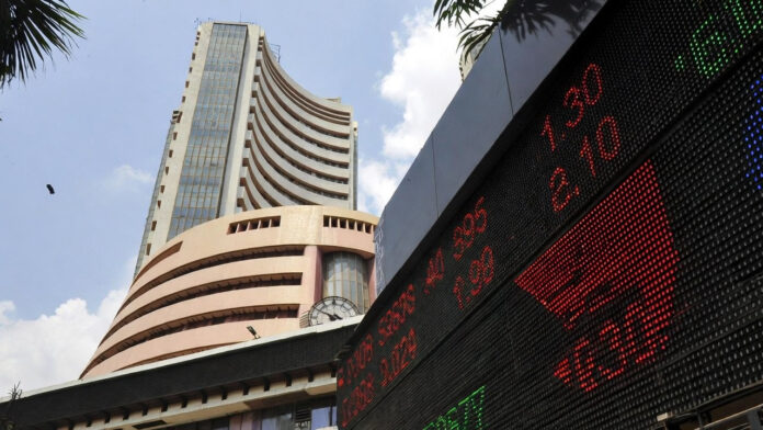 sensex-nifty-open-lower-feb BSE Sensex digital display board showing market decline at opening bell