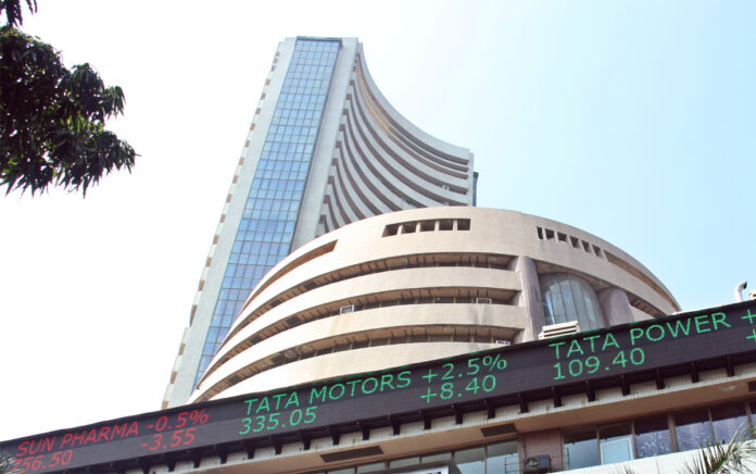 sensex-nifty-thursday-openi Bombay Stock Exchange building with Sensex ticker showing gains during Thursday trading session