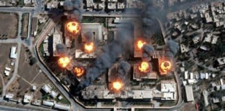 Satellite image showing damage and smoke near secure compound in Tehran amid Israel-US airstrikes