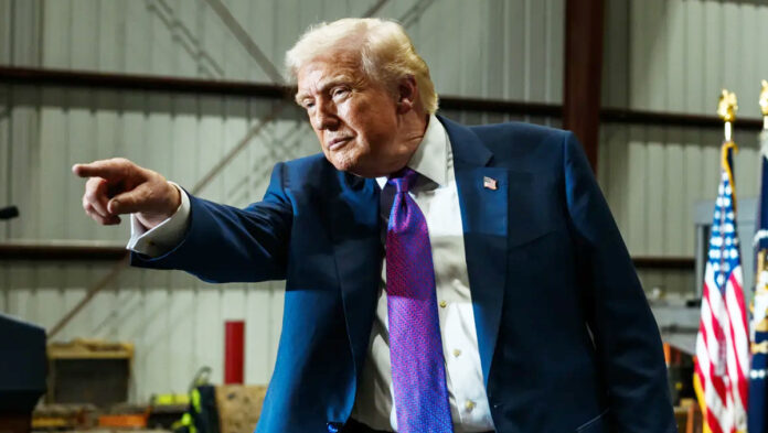 trump-126-percent-tariff-in Donald Trump speaking about U.S. tariffs as solar panels symbolize proposed 126% duties on Indian imports.