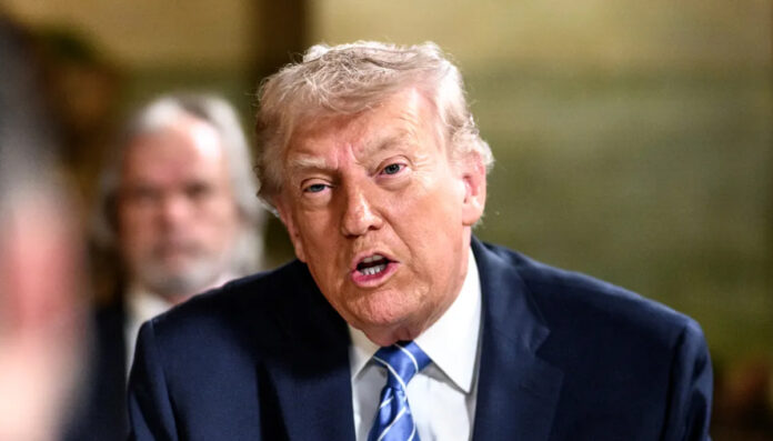 trump-global-tariff-announc Donald Trump speaking about global tariffs at a press briefing