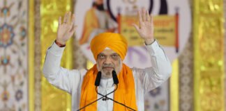 Union Minister for Home Affairs and Cooperation, Amit Shah addressing the gathered congregation