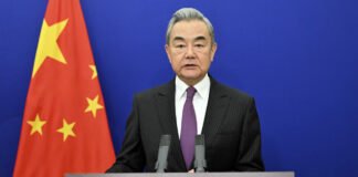 Chinese Foreign Minister Wang Yi at NPC press conference in Beijing March 2026 addressing US actions in Iran and Trump-Xi summit prospects