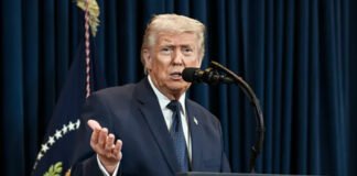 Donald Trump speaking about securing the Strait of Hormuz and urging allies to deploy warships