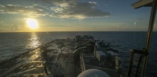 USS Tripoli amphibious assault ship with fighter jets deployed in Middle East waters