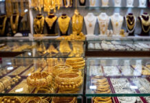 Gold, Silver Prices Fall Sharply in Delhi: Gold Drops ₹11,000, Silver Slides ₹20,000 in Bullion Market Gold and silver jewelry displayed in Delhi bullion market as prices decline