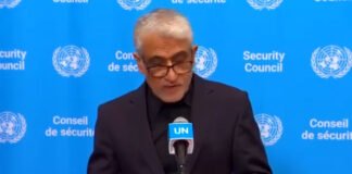 Iran's UN Ambassador Amir Saeid Iravani speaking at United Nations headquarters accusing US-Israel of civilian targeting in March 2026 conflict