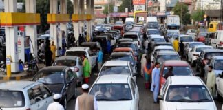 Long queues at petrol stations in Pakistan during severe fuel shortage and oil lockdown measures.