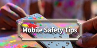 Smartphone covered in Holi colors and water with a person carefully cleaning it after Holi celebration.