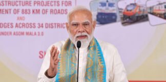 Prime Minister Narendra Modi addressing a public gathering during a development projects launch event in Guwahati, Assam.