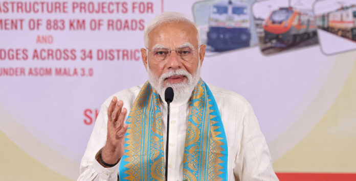 PM Modi Launches Development Projects in Assam Image Caption Prime Minister Narendra Modi addressing a public gathering during a development projects launch event in Guwahati, Assam.