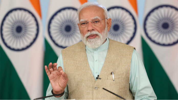 pm-modi-delhi-ring-metro-in Prime Minister Narendra Modi inaugurating Delhi's first Ring Metro corridor on International Women's Day March 8 2026 with backdrop of ₹33,500 crore projects