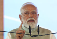 PM Modi Targets TMC at Kolkata Rally, Says ‘Change Is Inevitable in Bengal’ as ₹18,680 Crore Projects Launched Prime Minister Narendra Modi addressing a large rally at Brigade Parade Ground in Kolkata
