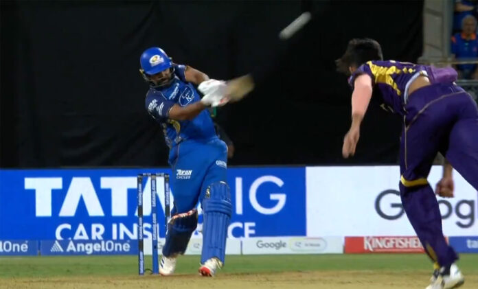 rohit-sharma-50th-ipl-fifty Rohit Sharma playing a powerful shot during MI vs KKR IPL 2026 match at Wankhede Stadium