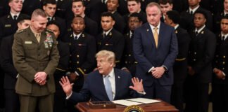 Donald Trump speaking in Memphis highlighting Pete Hegseth role in Iran military decision