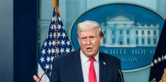 President Donald Trump delivering a video address on escalating Iran conflict
