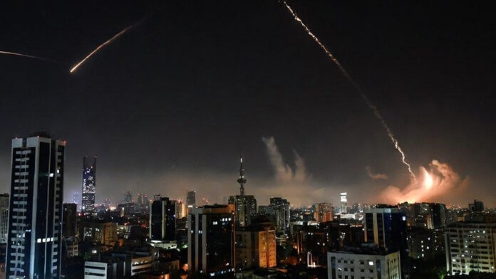 west-asia-conflict-missile- Missile trails over a Middle Eastern city skyline during escalating Iran-Israel conflict impacting global oil prices and markets