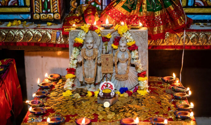 Akshaya-Tritiya-2026-Abujh- Akshaya Tritiya 2026 festival setup with Lakshmi Vishnu idols gold coins and ritual items