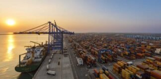 Adani Ports cargo terminal with containers and ships showing strong financial growth in Q4 FY26