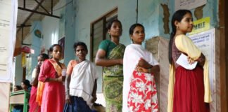 Voters standing in long queues during Assembly Elections 2026 in India