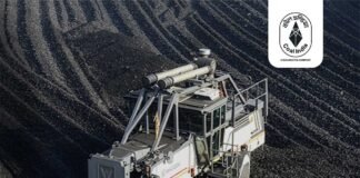 Coal India mining operations showing heavy machinery and coal extraction in India