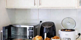 Kitchen appliances like microwave, air fryer, and electric cooker used for cooking without LPG during gas shortage