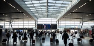 Indian passengers walking through Paris airport transit terminal after France removes transit visa requirement