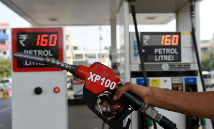 fuel-delhi-xp100-petrol-pri XP100 petrol price ₹160 per litre in Delhi with premium fuel pump and price board showing increase