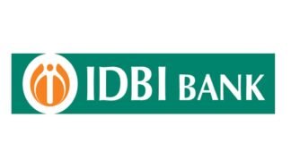 IDBI Bank branch exterior with financial charts showing Q4 FY26 results and profit decline