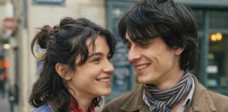 Couple looking at zodiac signs and love horoscope predictions