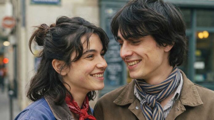 Couple looking at zodiac signs and love horoscope predictions
