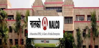 NALCO aluminium plant operations with industrial refinery and workers in safety gear