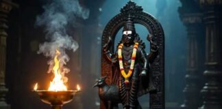 Devotees performing Shani Dev puja with mustard oil lamp on Shani Jayanti 2026