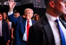 Gunfire Erupts at White House Correspondents’ Dinner; President Trump Safely Evacuated Security personnel evacuating President Donald Trump during gunfire incident at Washington Hilton