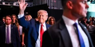 Security personnel evacuating President Donald Trump during gunfire incident at Washington Hilton