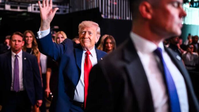 Trump Evacuated After Gunfire at White House Correspondents’ Dinner Security personnel evacuating President Donald Trump during gunfire incident at Washington Hilton