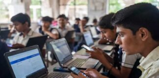 UP Board Result 2026 students checking results online laptop mobile anxious crowd