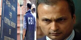 CBI officials conducting raids at Reliance group offices in Mumbai during fraud investigation