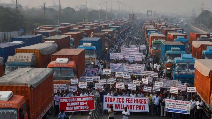 Delhi-NCR Truckers Protest ECC Hike and BS-4 Ban Truck drivers and transport unions protest in Delhi-NCR against ECC fee hikes and BS-4 vehicle restrictions during a three-day strike announcement.