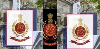 ED officials conducting financial investigation raids and seizing documents during money laundering probe in India