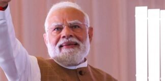Prime Minister Narendra Modi boarding aircraft before departing for UAE and Europe diplomatic tour