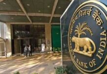 RBI May Announce Record-Breaking Dividend to Indian Government Amid Global Economic Uncertainty Reserve Bank of India headquarters building with financial charts representing record dividend transfer to the government