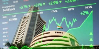 Traders monitor stock market data as Sensex rises over 315 points and Nifty crosses 23,700 in early trade