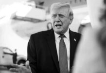 Trump Warns Iran of “Deal or Destruction” as He Rejects War Powers Limits Amid Rising Tensions Donald Trump speaking at the White House addressing Iran tensions and military options
